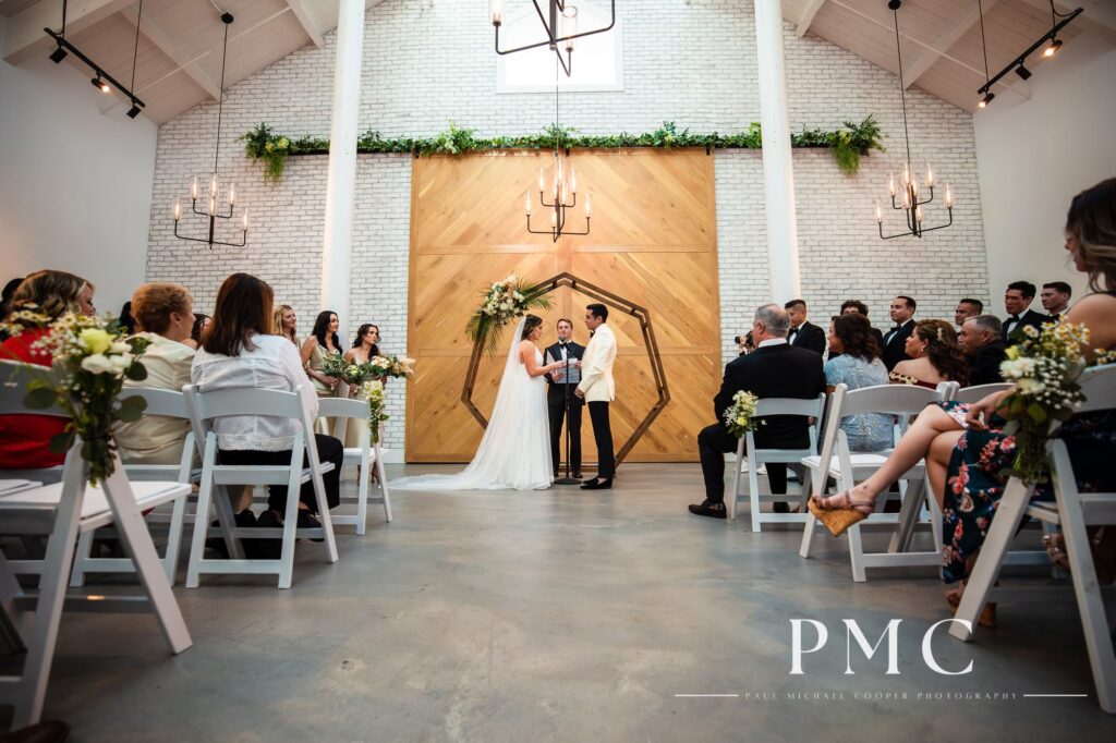 A wide shot of an intimate chapel wedding ceremony in Carlsbad, Southern California.