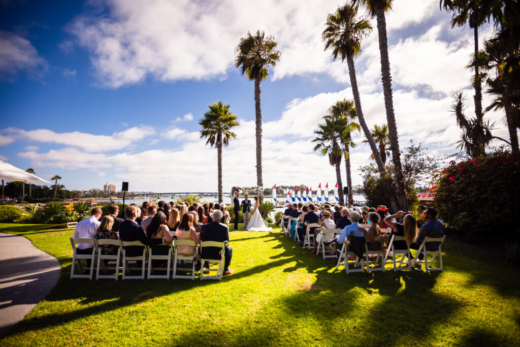 Outdoor wedding ceremony overlooking Mission Bay at Paradise Point Resort in San Diego.