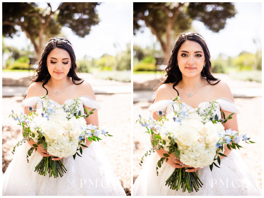 A bride smiles with her floral bouquet among the foliage at The Heights Golf Club.