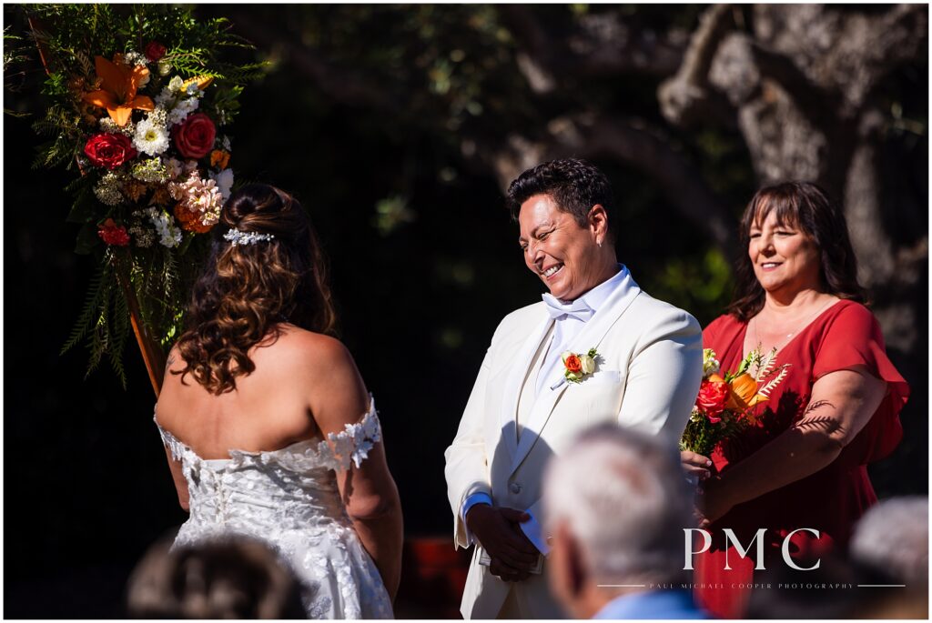 Two brides celebrate their terracotta-themed summer wedding at the historical Rancho Minerva Wedding Venue in Vista.