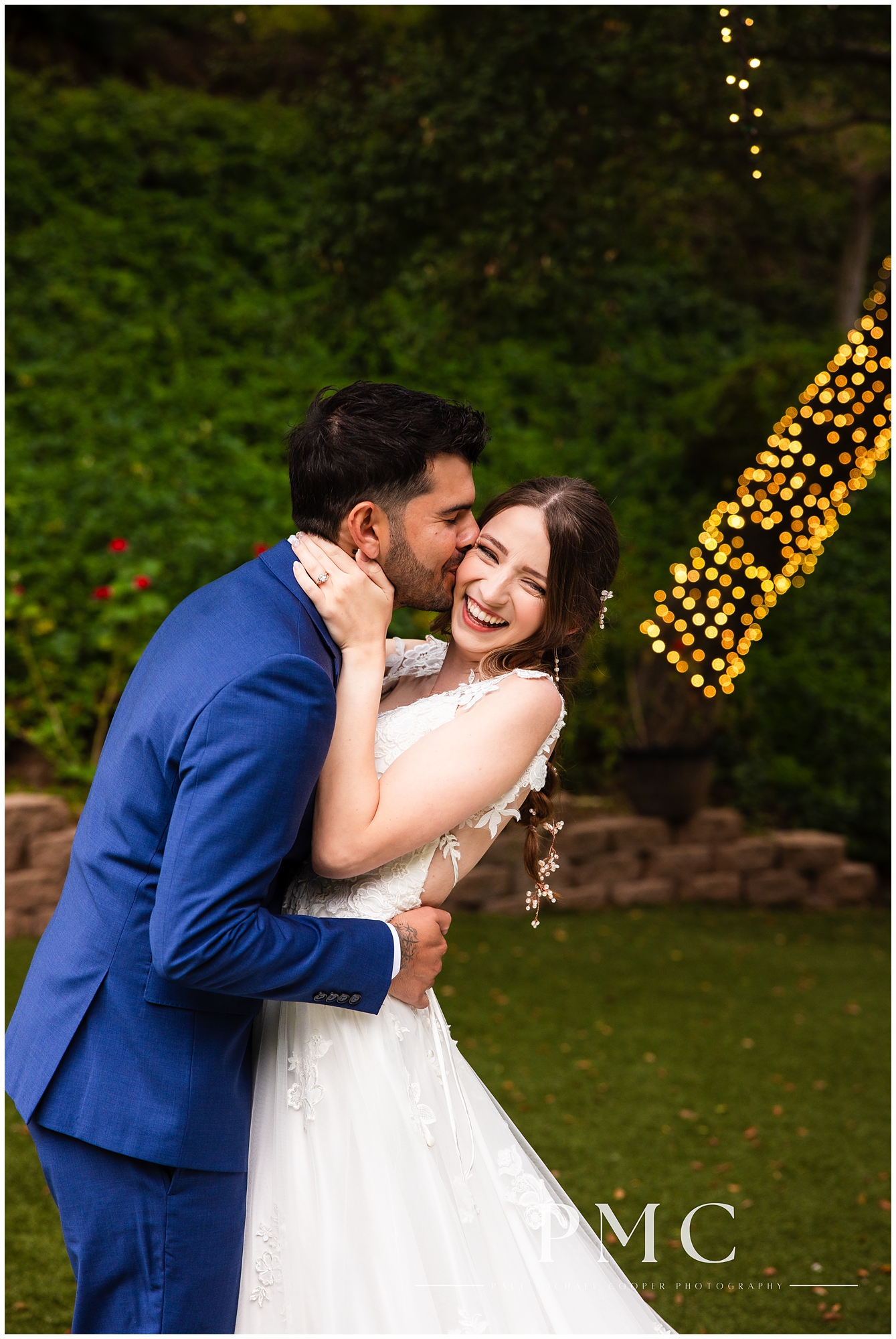 A bride and groom share a romantic kiss at Los Willows Wedding Estate.