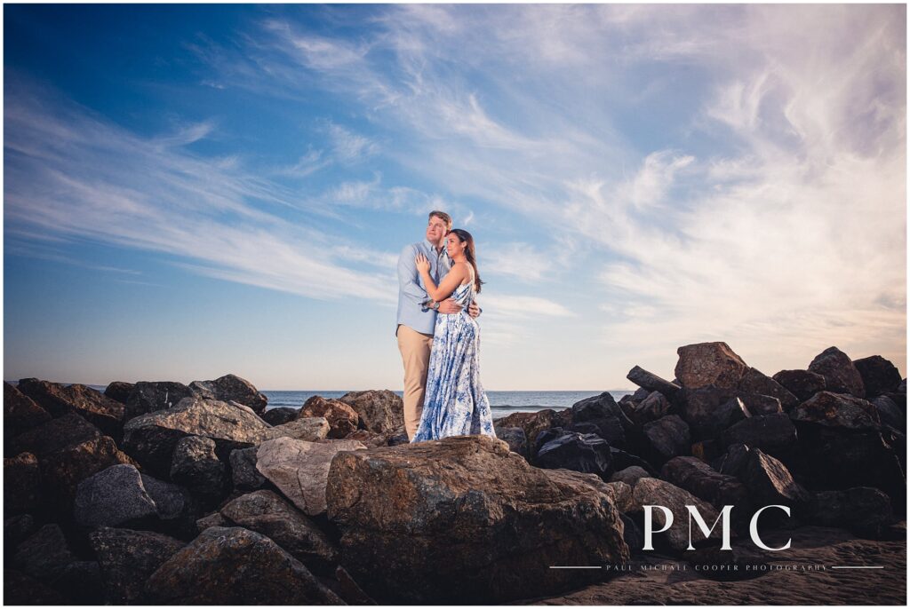 Cinematic engagement photo on Coronado Beach, San Diego.