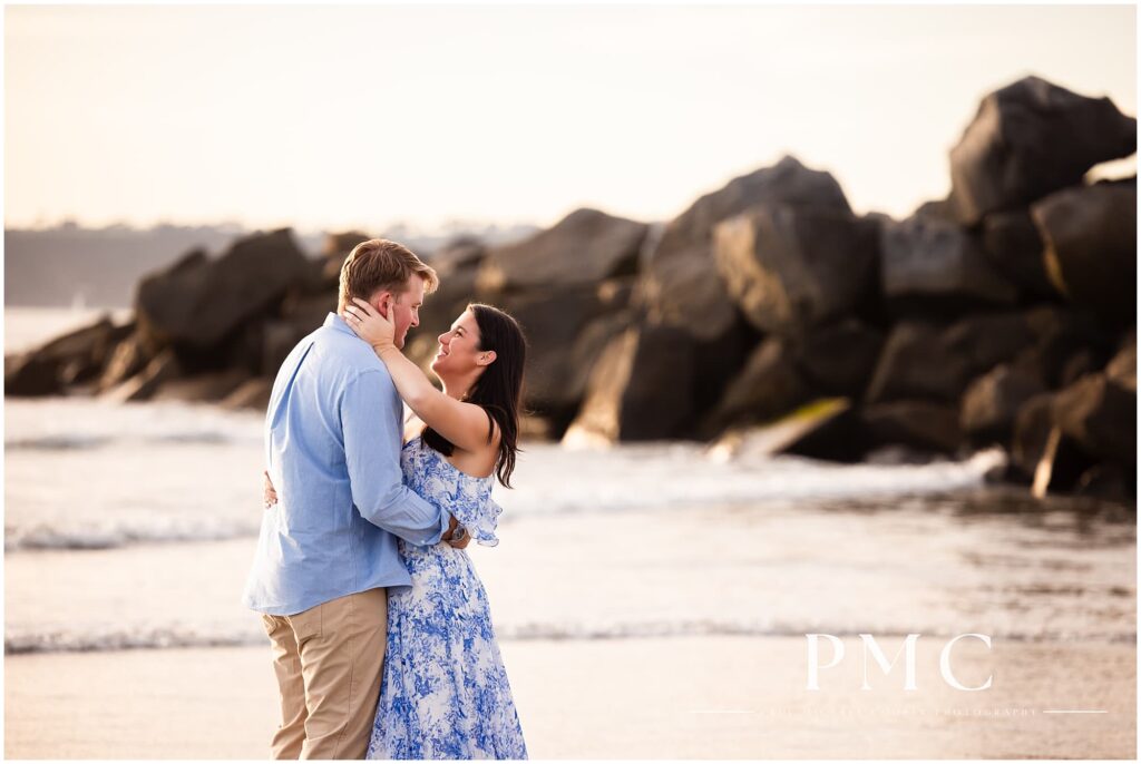 Romantic engagement photo on Coronado Beach, San Diego.